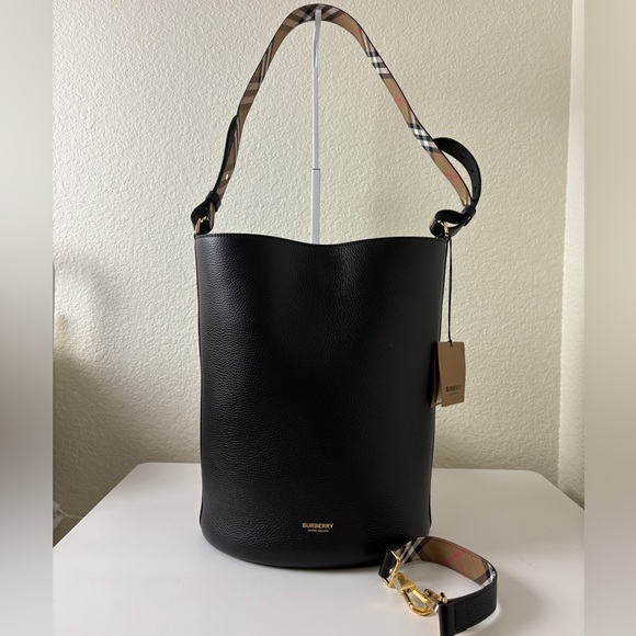 Burberry Handbags - Burberry Black Leather Bucket Bag Vintage Check Strap